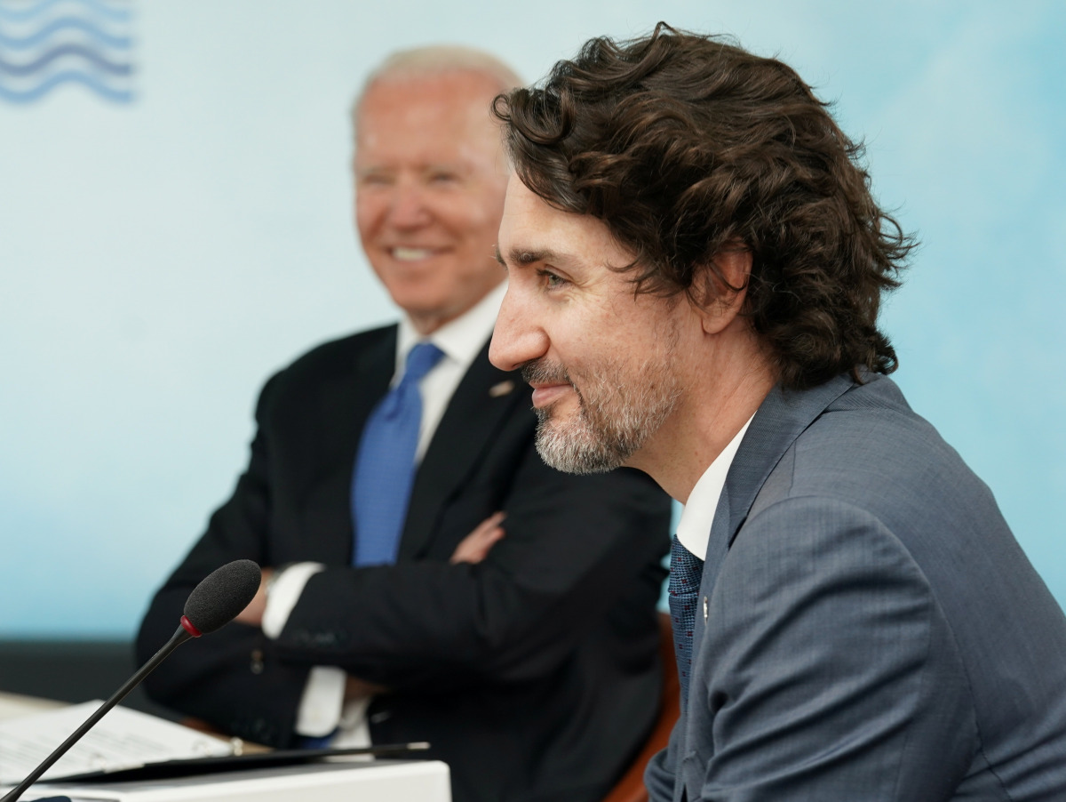 U.S. President Joe Biden and Canada's Prime Minister Justin Trudeau attend a session during the G7 summit in Carbis Bay, Cornwall, Britain, June 11, 2021. REUTERS/Kevin Lamarque/Pool
