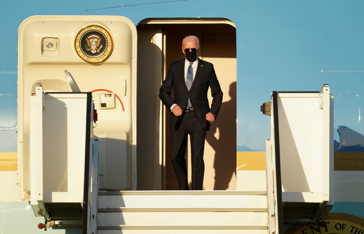 U.S. President Joe Biden arrives aboard the Air Force One ahead of a NATO summit, at Brussels Military Airport in Melsbroek, Belgium June 13, 2021. REUTERS/Kevin Lamarque
