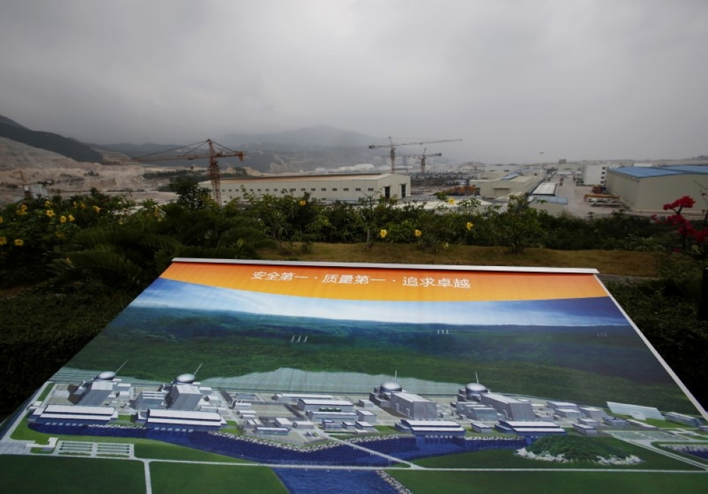 File photo: An artist impression of Taishan Nuclear Power Plant is displayed on a viewing platform overlooking the construction site in Taishan, Guangdong province, October 17, 2013. Reuters/Bobby Yip/File Photo