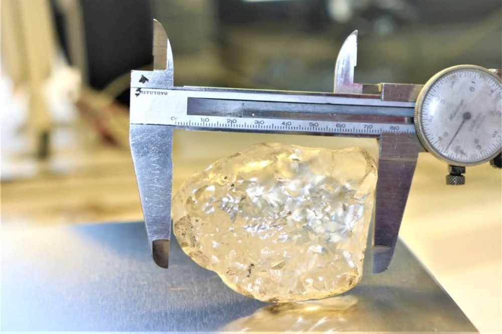 A 1,098 carat diamond, discovered in Botswana and believed to be the third largest gem-quality stone ever to be mined, is seen in this undated handout picture received June 16, 2021. Debswana Diamond Company