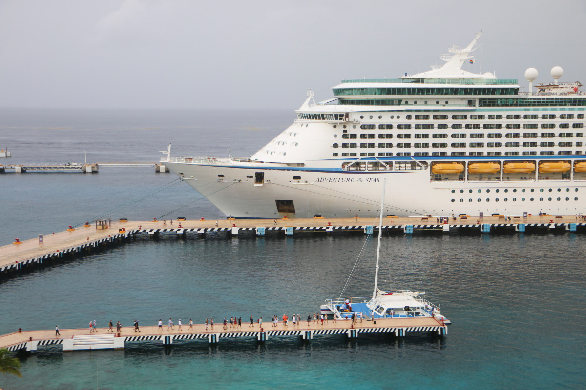 Tourists disembark from the cruise ship Adventure of the Seas, operated by Royal Caribbean International, the first cruise ship carrying tourists to Cozumel since the outbreak of the coronavirus disease (COVID-19) pandemic in March 2020, in Cozumel, Mexic