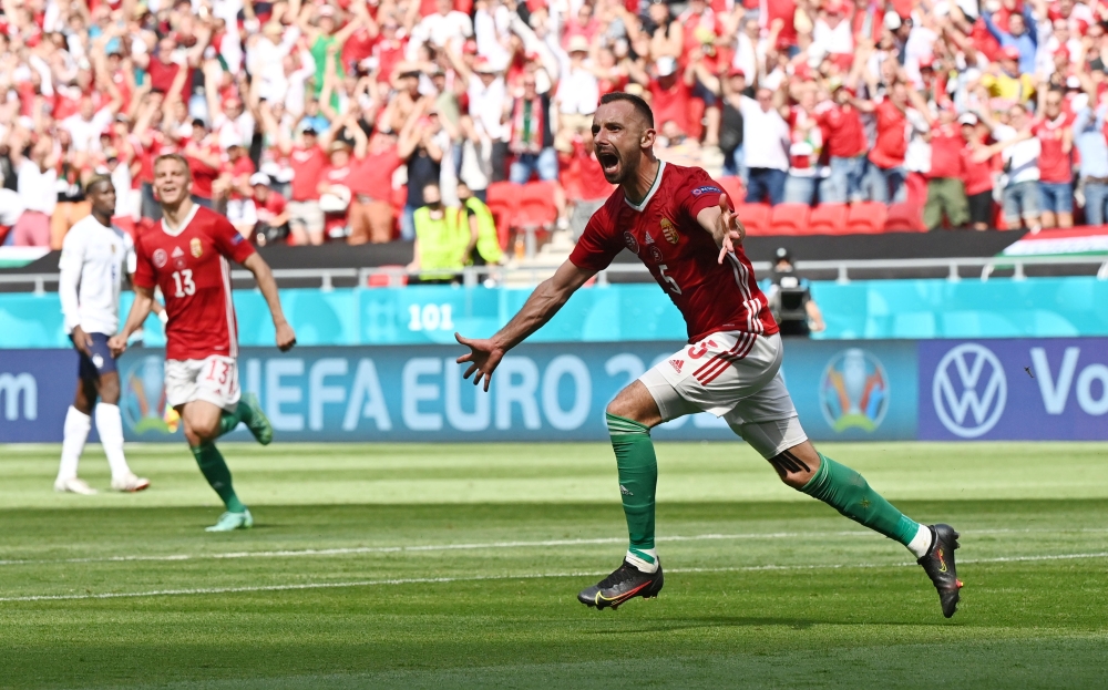 Hungary's Attila Fiola celebrates scoring their first goal. (REUTERS/Tibor Illyes)
