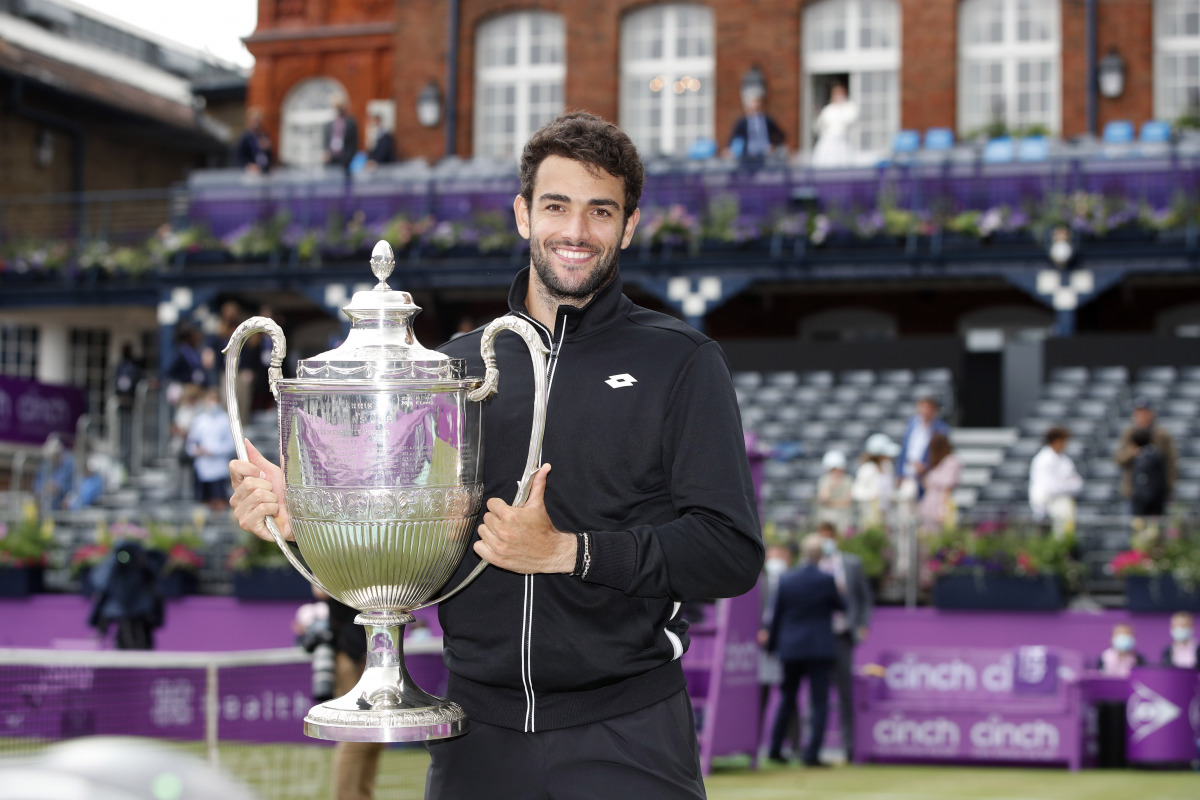 Tennis - ATP 500 - Queen's Club Championships - Queen's Club, London, Britain - June 20, 2021 Italy's Matteo Berrettini poses as he celebrates winning the final match against Britain's Cameron Norrie with the trophy Action Images via Reuters/Paul Childs
