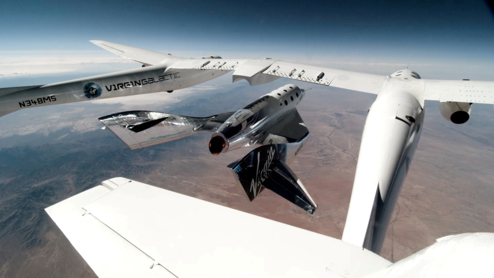 Virgin Galactic's VSS Unity, piloted by CJ Sturckow and Dave Mackay, is released from its mothership, VMS Eve, on the way to its first spaceflight after launch from Spaceport America, New Mexico, U.S. May 22, 2021 in a still image from video. Virgin Galac