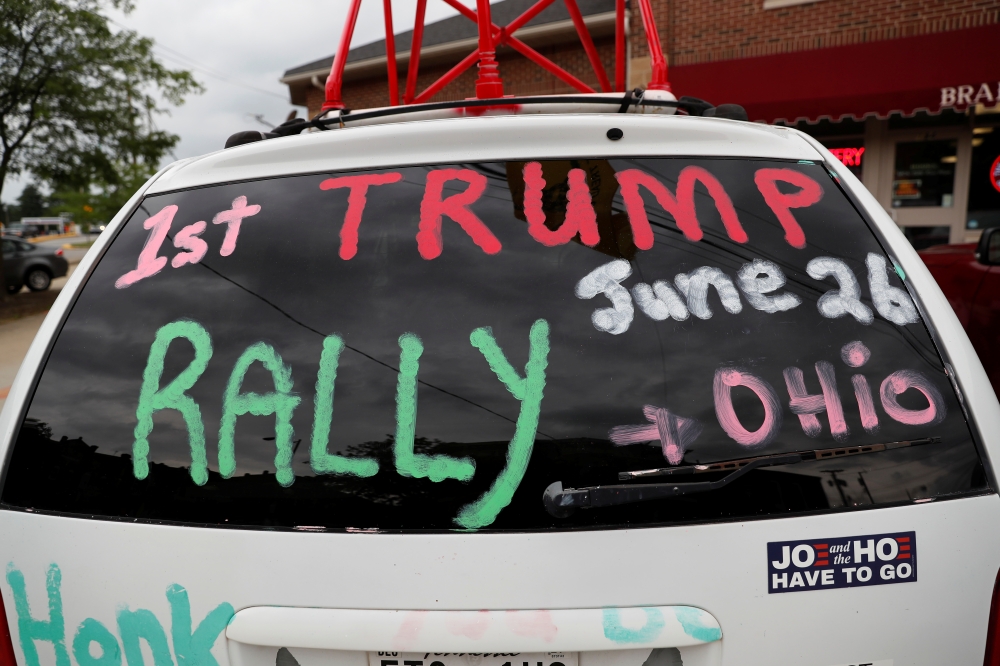 A car is painted in support of former U.S. President Donald Trump's first post-presidency campaign rally at the Lorain County Fairgrounds in Wellington, Ohio, U.S., June 25, 2021. (Reuters/Shannon Stapleton)
