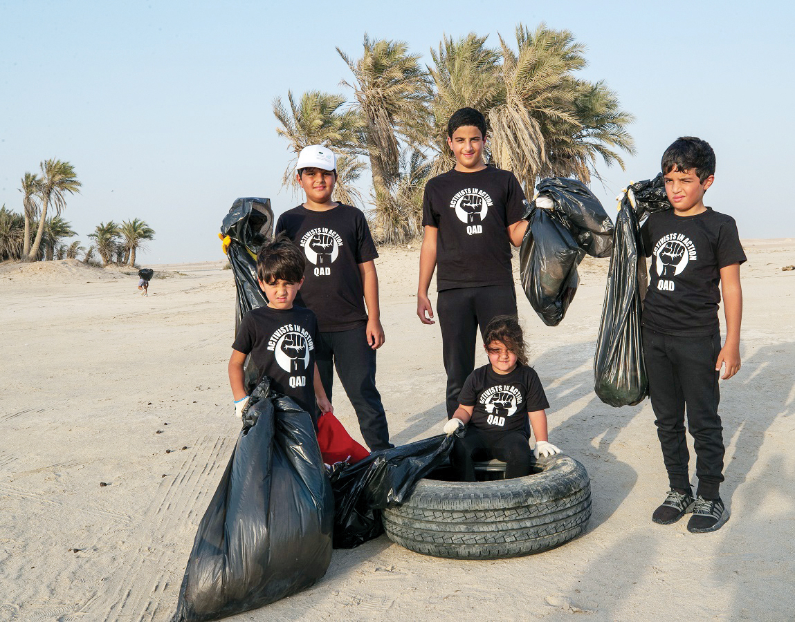 Qatar Academy Doha students during a beach clean-up campaign.