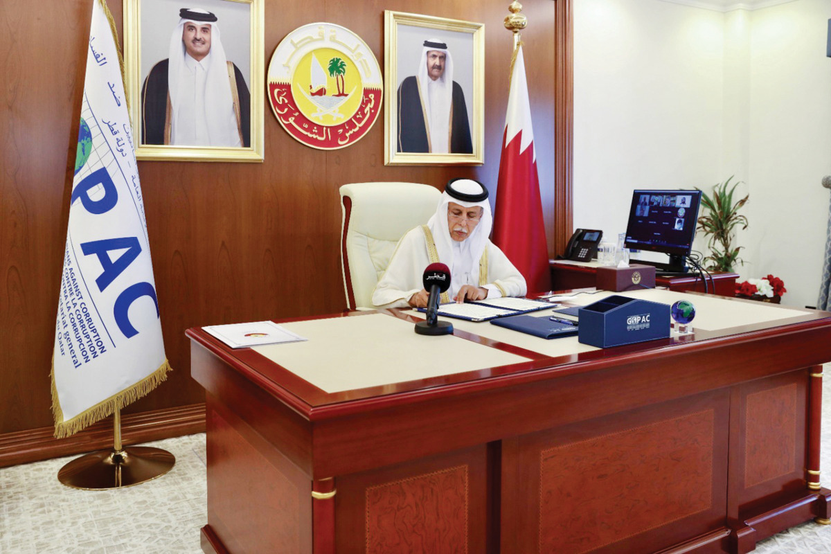 Speaker of the Shura Council and Chairperson of GOPAC, H E Ahmed bin Abdullah bin Zaid Al Mahmoud, signing a memorandum of understanding on behalf of Global Organization of Parliamentarians Against Corruption.