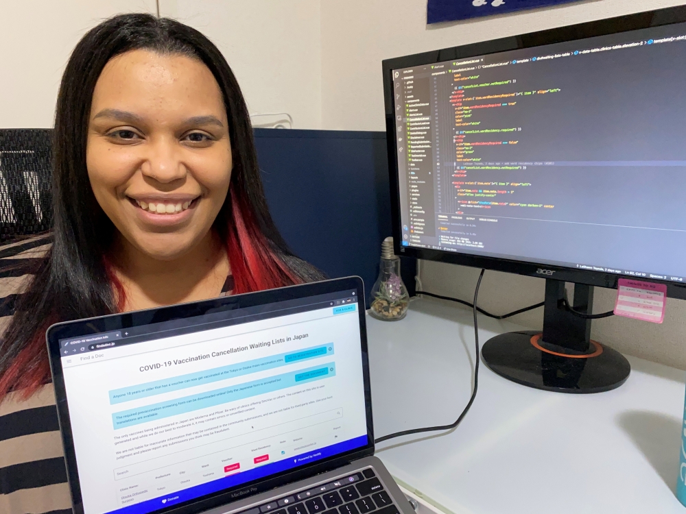 LaShawn Toyoda, a 36-year-old American working mother in Japan who has created a digital database on clinics offering coronavirus disease (COVID-19) vaccination shots, is pictured in Tokyo, Japan, June 30, 2021. LaShawn Toyoda/via REUTERS