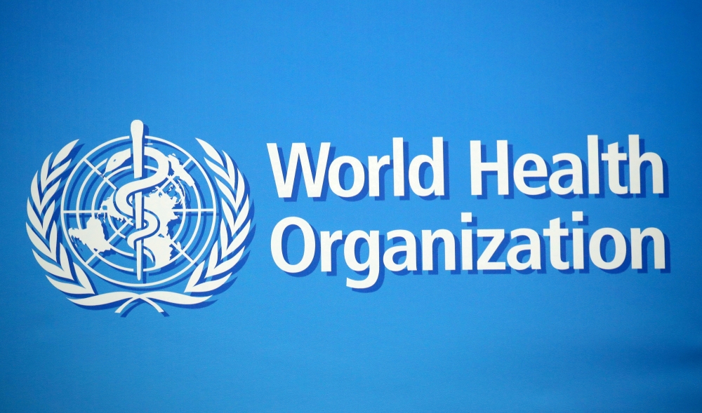 A logo is pictured at the World Health Organization (WHO) building in Geneva, Switzerland, February 2, 2020. REUTERS/Denis Balibouse/File Photo