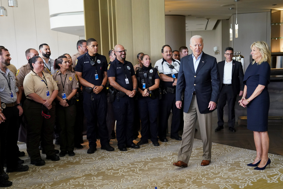 U.S. President Joe Biden and first lady Jill Biden meet rescue teams and first responders on the building collapse in Surfside in Miami, Florida U.S., July 1, 2021. REUTERS/Kevin Lamarque
