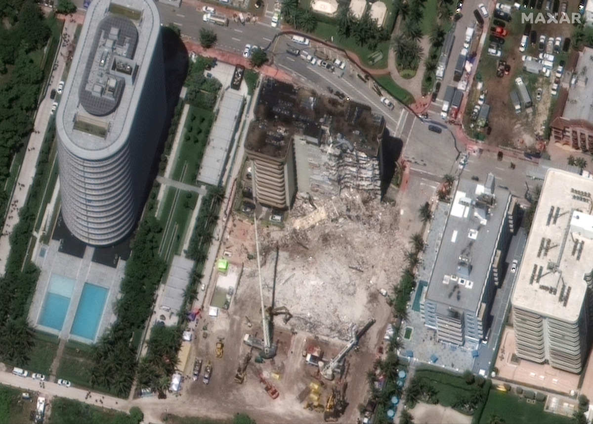 A satellite view shows the collapsed Champlain Towers condo building, in Surfside near Miami Beach, Florida, U.S., July 3, 2021. @Maxar Technologies/Handout via REUTERS