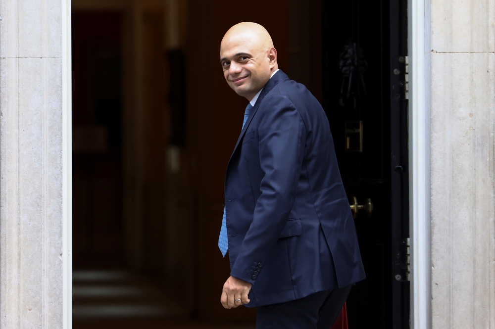 Britain's new Health Secretary Sajid Javid walks in Downing Street, in London, Britain, June 30, 2021. REUTERS/Henry Nicholls