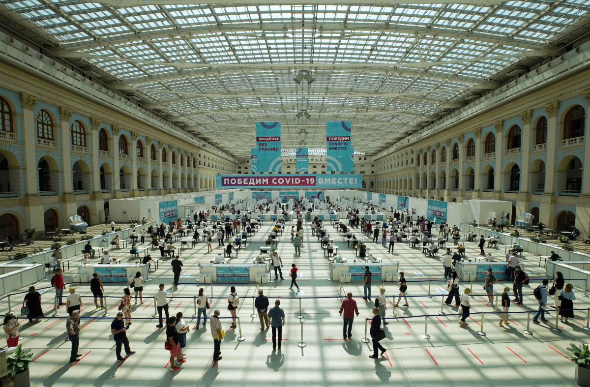 People wait to receive a vaccine against the coronavirus disease (COVID-19) at a vaccination centre in Gostiny Dvor in Moscow, Russia July 6, 2021. REUTERS/Tatyana Makeyeva
