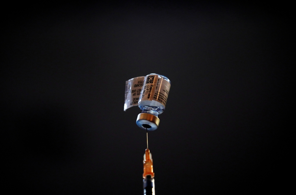 FILE PHOTO: A vial of Pfizer-BioNTech vaccine is pictured REUTERS/Edgar Su/File Photo
