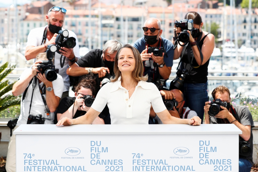 Actress Jodie Foster poses during a photocall before being awarded with an honorary Palme d'Or prize, during the opening ceremony. (REUTERS/Johanna Geron )
