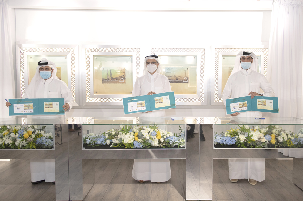 Minister of Culture and Sports, H E Salah bin Ghanem Al Ali, and other officials unveiling the new postage stamps celebrating the country’s Islamic landmarks. 