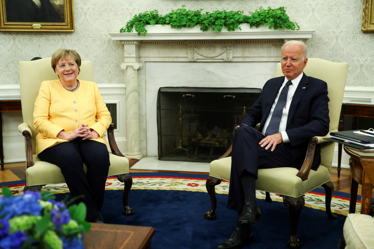 U.S. President Joe Biden holds a bilateral meeting with German Chancellor Angela Merkel in the Oval Office at the White House in Washington, U.S., July 15, 2021. REUTERS/Tom Brenner

