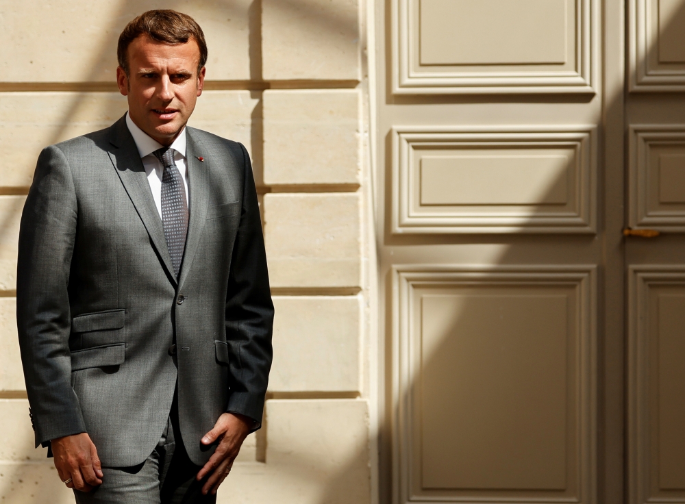 French President Emmanuel (Ludovic Marin/Reuters)