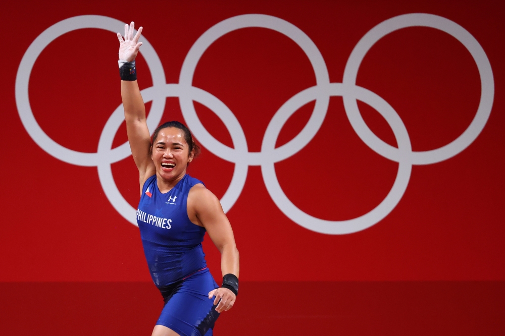 Hidilyn Diaz of the Philippines celebrates after a lift. Reuters/Edgard Garrido