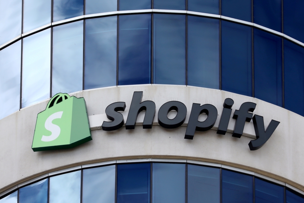 The logo of Shopify is seen outside its headquarters in Ottawa, Ontario, Canada, September 28, 2018. REUTERS/Chris Wattie//File Photo