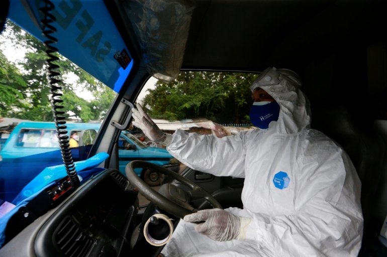 File Photo: Sunaryo drives an ambulance as he delivers a patient suffering from coronavirus disease (COVID-19), as cases surge in Depok, on the outskirts of Jakarta, Indonesia, July 13, 2021. REUTERS/Ajeng Dinar Ulfiana
