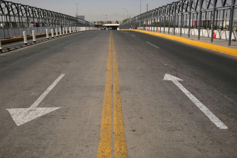 FILE PHOTO: A general view of the Zaragoza-Ysleta border bridge crossing towards El Paso, Texas, U.S., as Mexico's Department of Foreign Relations requested another month-long extension on land-crossing restrictions at the U.S.-Mexico border due to the co