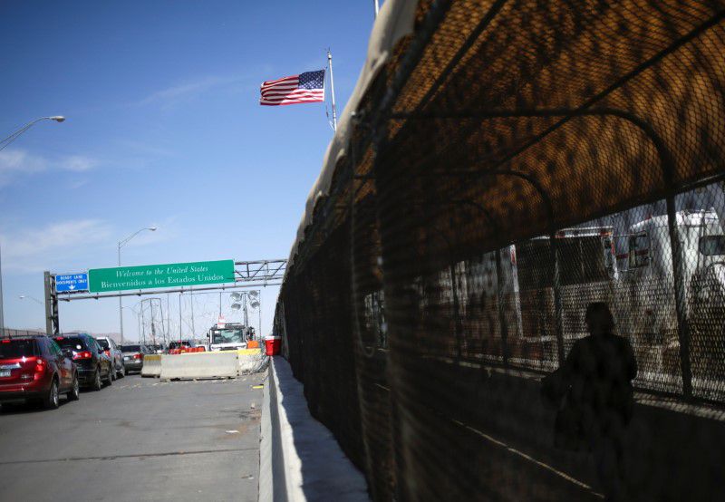 FILE PHOTO: Vehicles wait in line to cross the Cordova Bridge of the Americas (El Paso CBOA) towards El Paso, Texas, U.S., as Mexico's Department of Foreign Relations requested another month-long extension on land-crossing restrictions at the U.S.-Mexico 