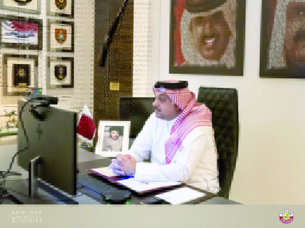 Deputy Prime Minister and Minister of State for Defense Affairs H E Dr. Khalid bin Mohammed Al Attiyah signing an agreement virtually with Canadian Minister of National Defence 	H E Harjit Sajjan.
