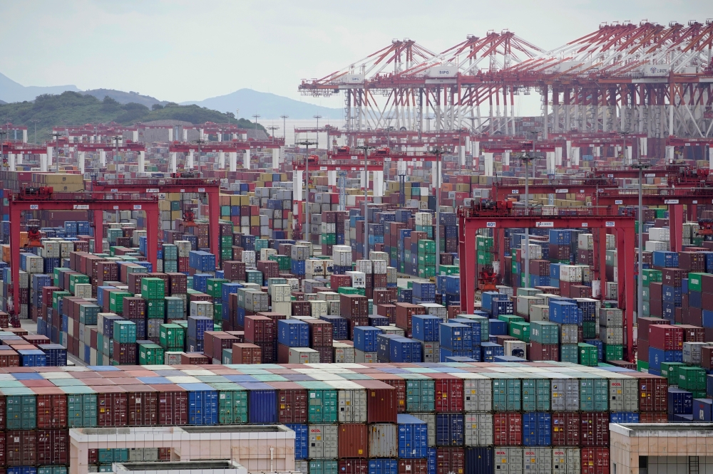 Containers are seen at the Yangshan Deep-Water Port in Shanghai, China October 19, 2020. REUTERS/Aly Song/File Photo/File Photo