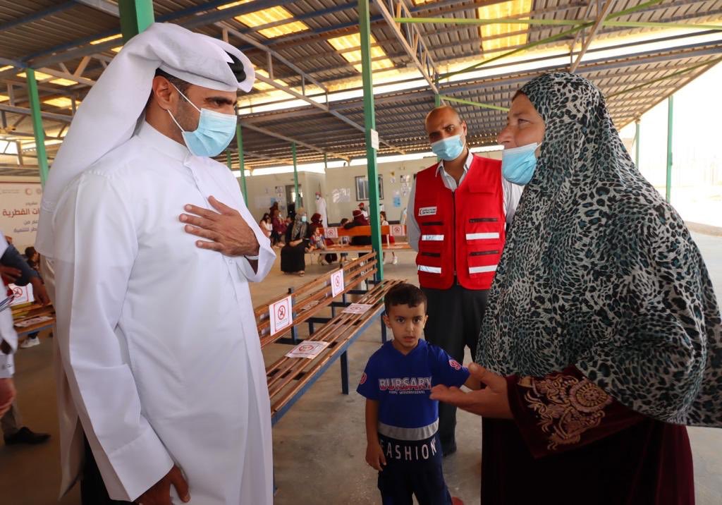 A QFFD official visits a health care centre for Syrian refugees in Jordan. 