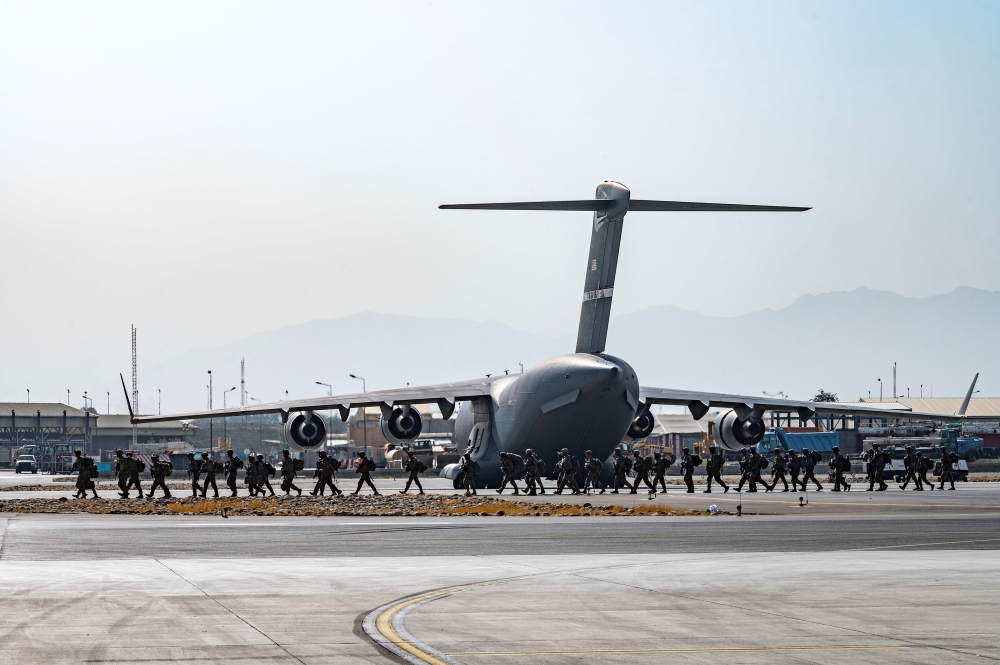 U.S. Soldiers, assigned to the 82nd Airborne Division, arrive to provide security in support of Operation Allies Refuge at Hamid Karzai International Airport in Kabul, Afghanistan, August 20, 2021. 