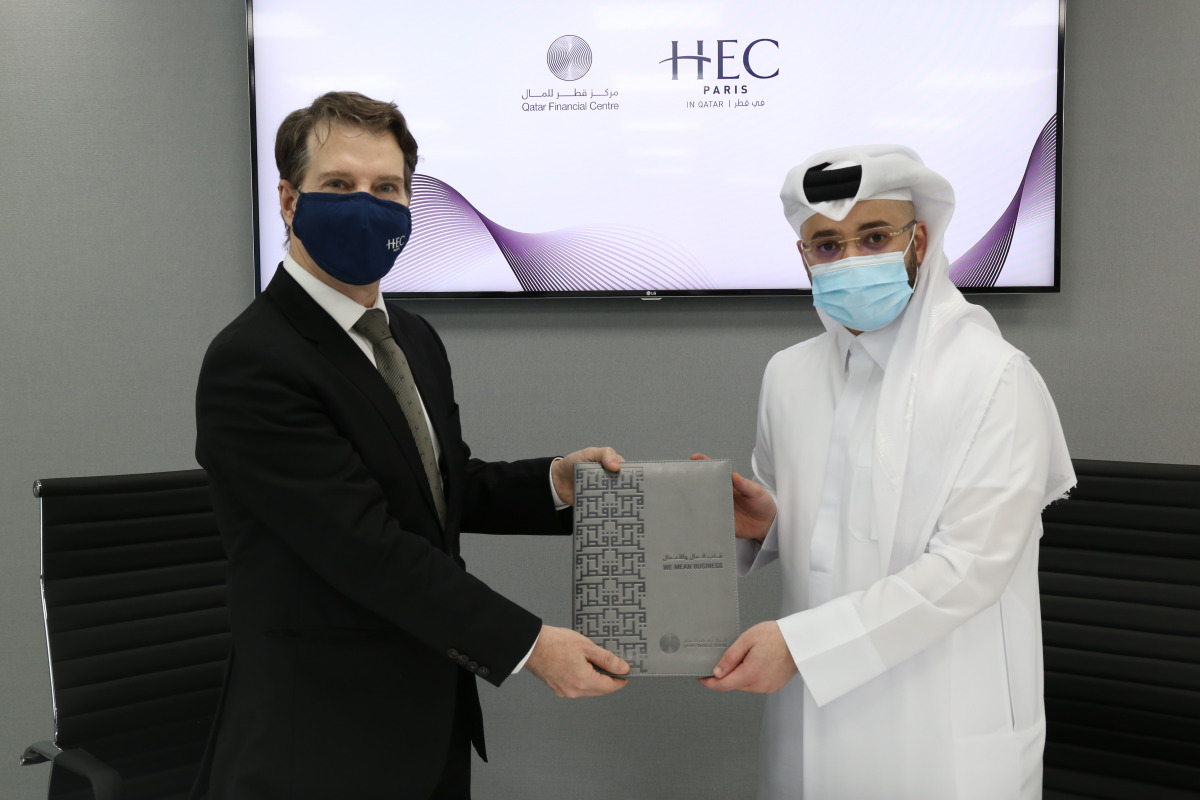HEC Paris in Qatar and Financial Centre Authority officials during the signing of an MoU.