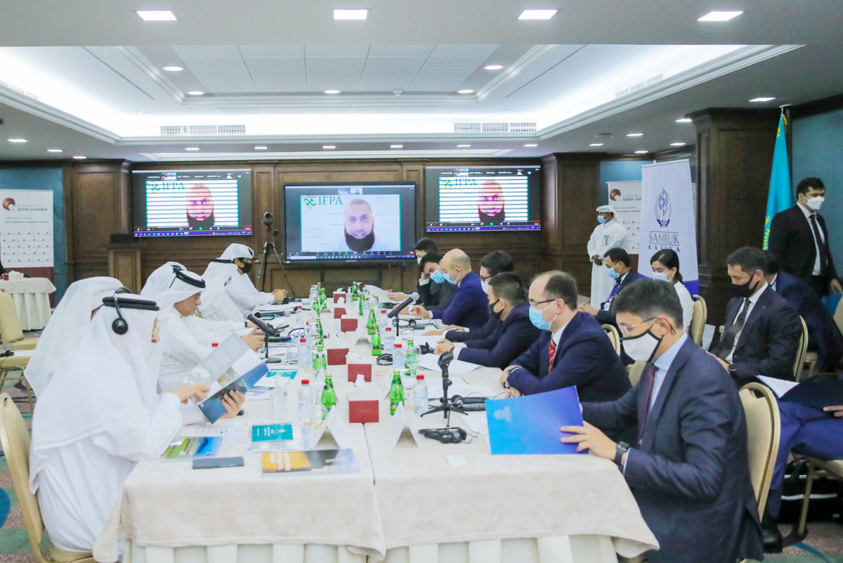 Qatari and Kazakh officials during the meeting hosted by Qatar Chamber yesterday. 