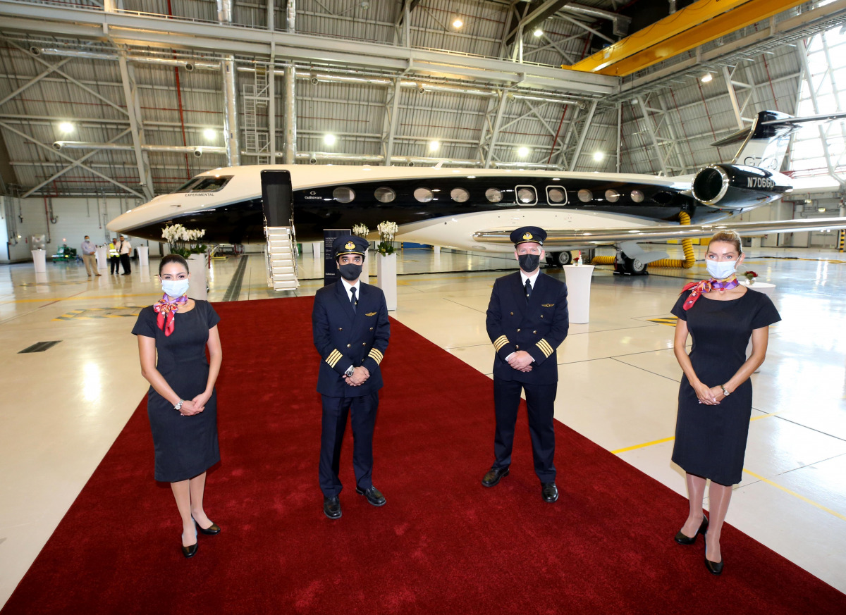 Qatar Executive crew with the Gulfstream G700 jet aircraft.