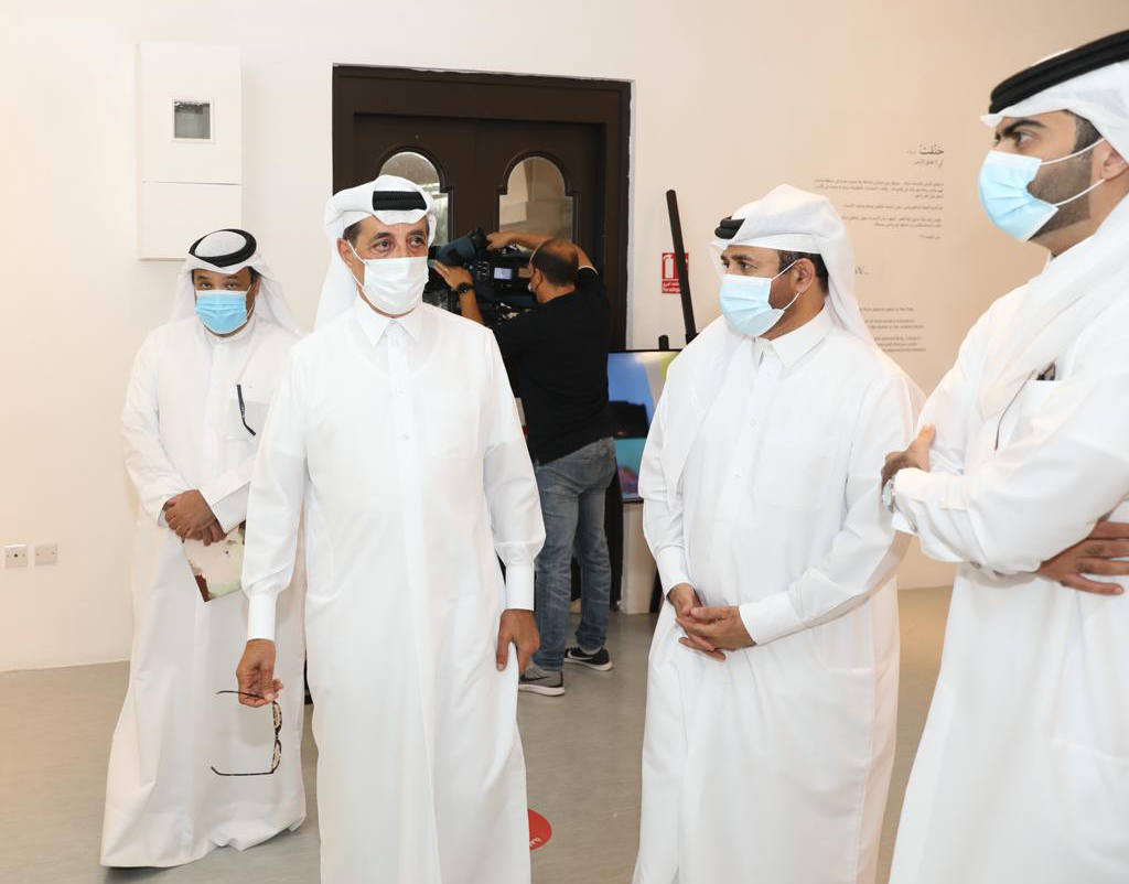 Minister of State and President of Qatar National Library H E Dr. Hamad bin Abdulaziz Al Kuwari, and General Manager of Cultural Village Foundation (Katara) Dr. Khalid bin Ibrahim Al Sulaiti with other officials touring Ali Al Naama art exhibition.