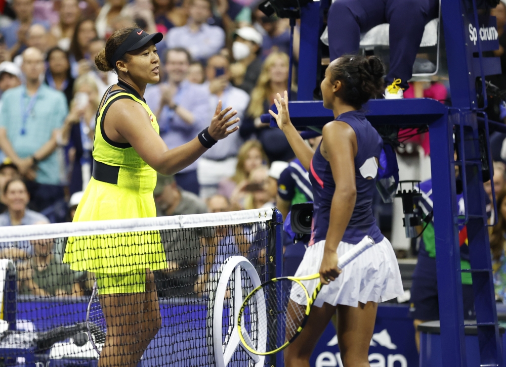 Leylah Fernandez of Canada, right, shakes hands with Naomi Osaka of Japan after a third round match on day five of the 2021 US Open tennis tournament. Jerry Lai-USA TODAY Sports