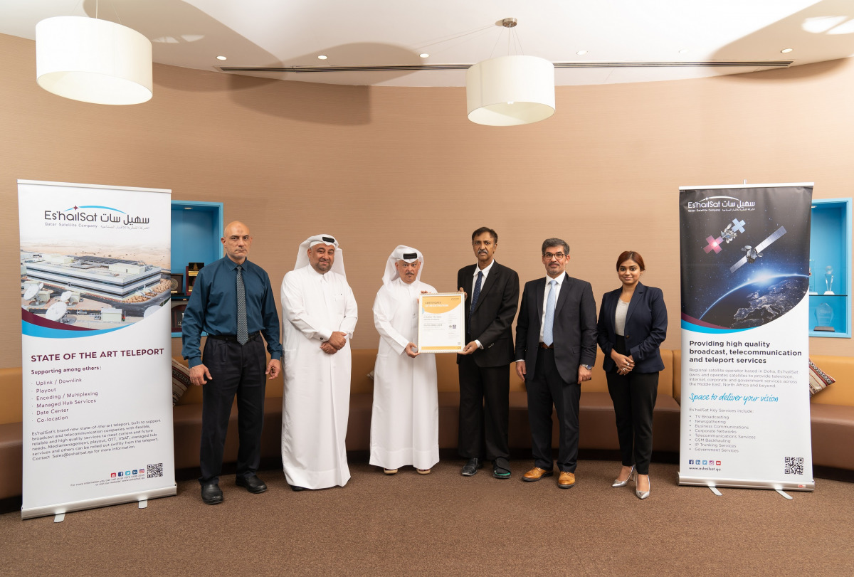 Vice President-Commercial Hamad Al Mannai receiving the certificate on behalf of Es’hailSat from Sridhar Kasturi. Others in the picture are Es’hailSat IT Manager Omar Al Arab; Executive Director Finance & IT Hussain Al Marzouqi; OISSG Director Khalid King