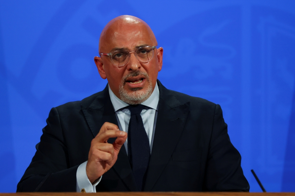 Britain's COVID-19 Vaccine Deployment Minister Nadhim Zahawi speaks during a media briefing on the coronavirus disease (COVID-19) pandemic, at Downing Street in London, Britain, June 23, 2021. REUTERS/Tom Nicholson/Pool/File Photo