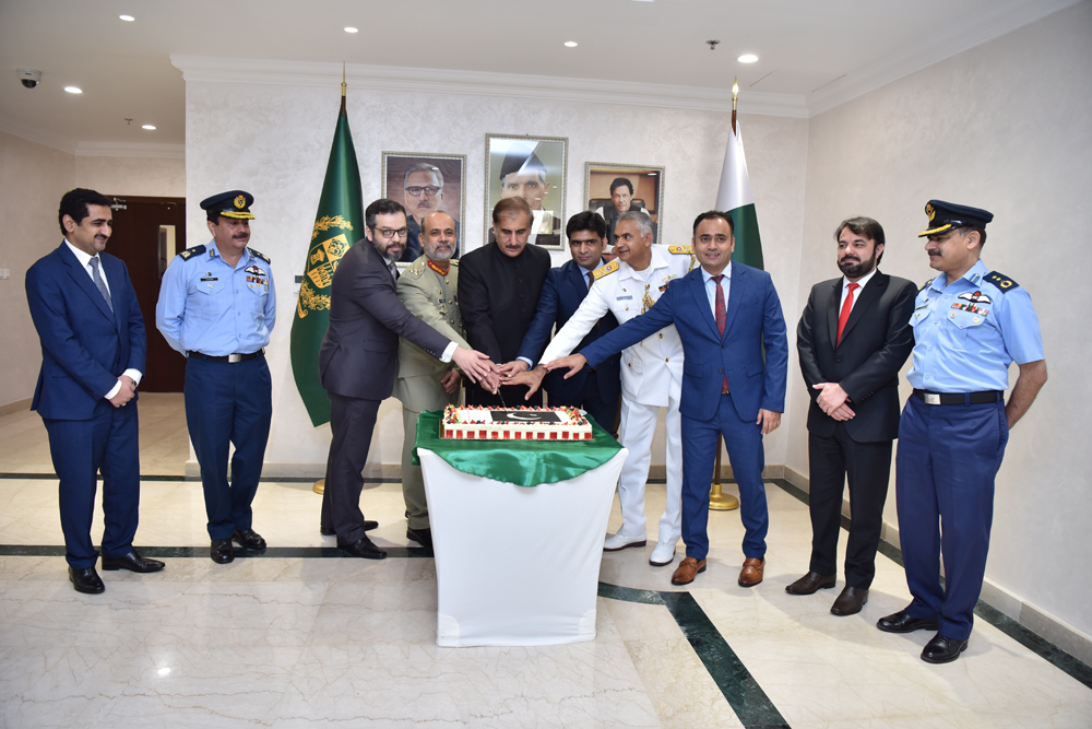 Pakistan Ambassador to Qatar H E Syed Ahsan Raza Shah with other officials during the celebration of Defence Day of Pakistan at the Embassy premises, yesterday.