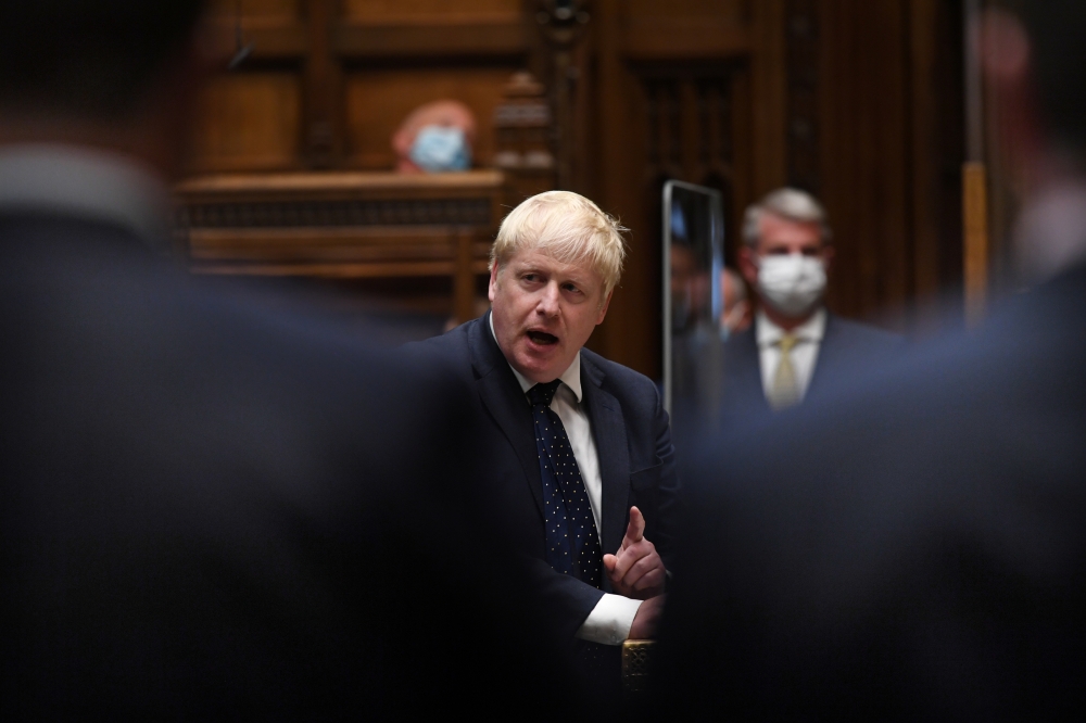 Britain's Prime Minister Boris Johnson addresses lawmakers about the withdrawal from Afghanistan, in London, Britain September 6, 2021. UK Parliament/Jessica Taylor/Handout via Reuters