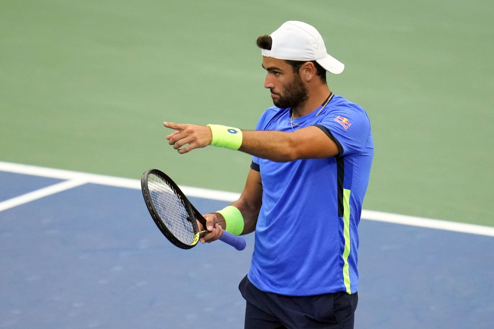 Matteo Berrettini of Italy points to Oscar Otte of Germany after winning the match on day eight of the 2021 U.S. Open tennis tournament at USTA Billie Jean King National Tennis Center. Danielle Parhizkaran-USA TODAY Sports
