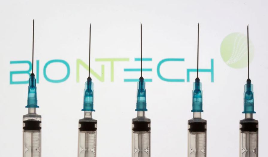 FILE PHOTO: Oliver Ortega, 13, receives the second dose of the Pfizer-BioNTech 