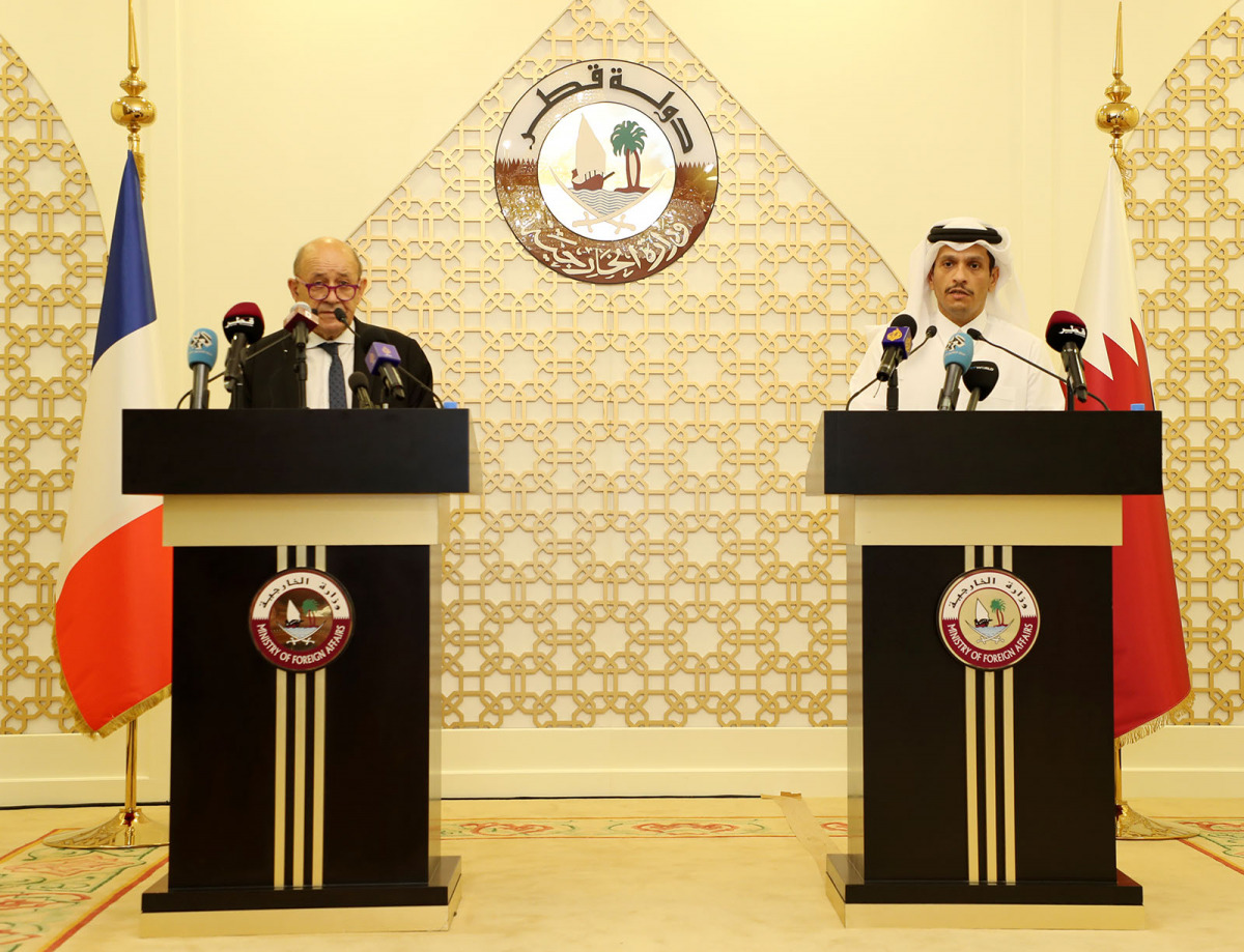 Deputy Prime Minister and Minister of Foreign Affairs H E Sheikh Mohammed bin Abdulrahman Al Thani and Minister for Europe and Foreign Affairs of the French Republic H E Jean-Yves Le Drian, addressing a joint press conference, in Doha, yesterday.