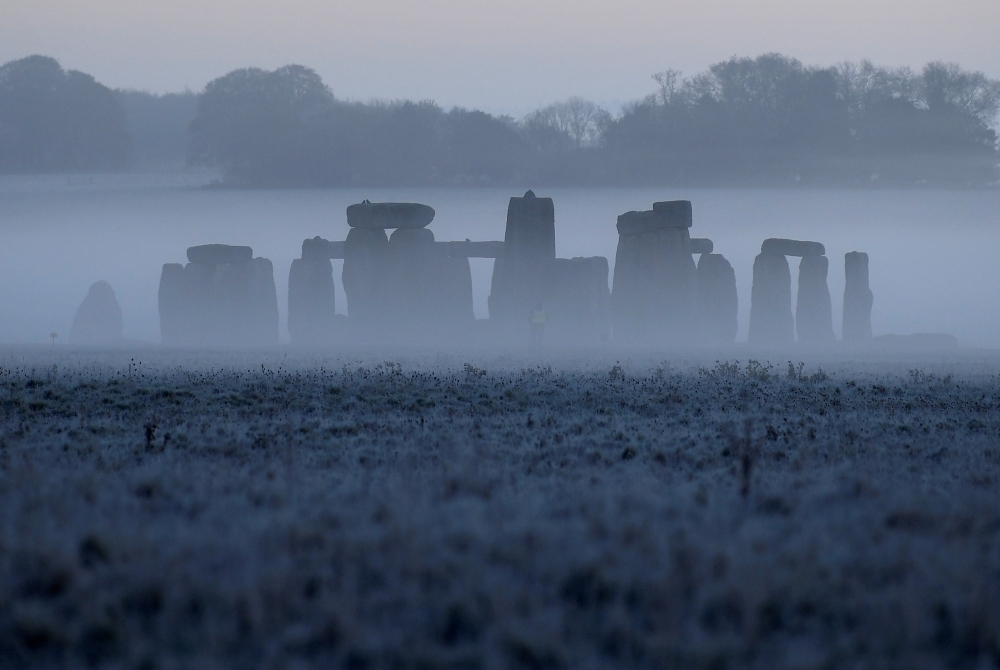 Stonehenge ancient stone circle is seen at dawn, near Amesbury, Wiltshire, Britain, November 4, 2020. REUTERS/Toby Melville//File Photo
 