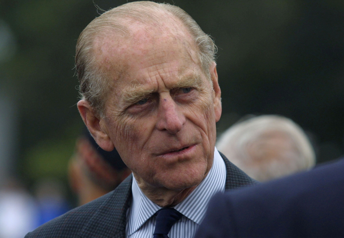 FILE PHOTO: The Duke of Edinburgh Prince Philip talks to ex-servicemen during a wreath-laying ceremony commemorating the 80th anniversary of the Malta Branch of the British Legion at Malta's Cenotaph War Memorial in Floriana, outside Valletta April 29, 20