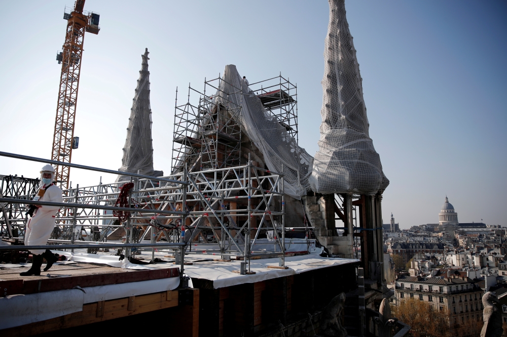 A view shows the reconstruction site of the roof of the Notre-Dame de Paris Cathedral, which was damaged in a devastating fire two years ago, as restoration works continue, in Paris, France, April 15, 2021. Reuters/Benoit Tessier/Pool/File Photo