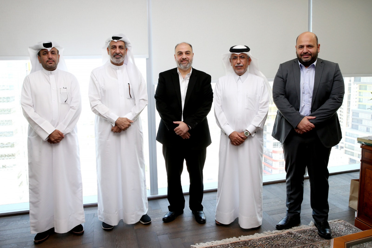 CEO of Dar Al Sharq Group Abdullatif Al Mahmoud; CEO of Fadaat Media Group Moayed Al Dib; Deputy CEO of Dar Al Sharq Jaber Al Harami; and CEO of Haweyah Jassim Salman during the signing ceremony.