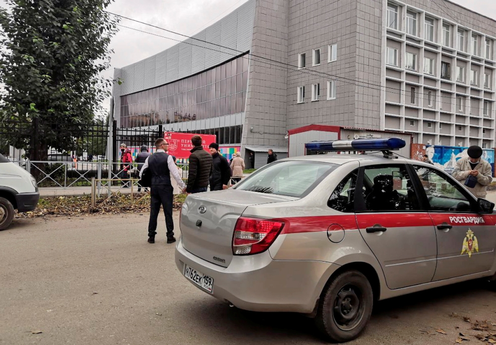 A car of Russia's National Guard is seen at the scene after a gunman opened fire at the Perm State University in Perm, Russia September 20, 2021. REUTERS/Anna Vikhareva 