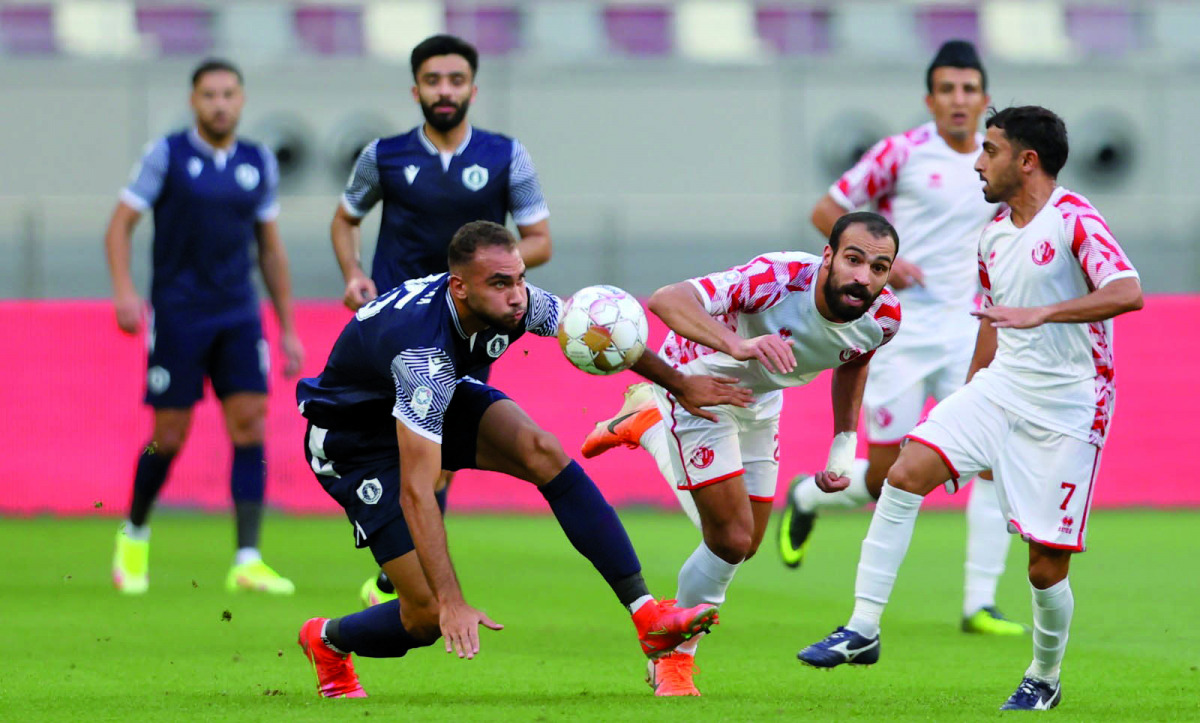 Action during the QSL match between Al Shamal and Qatar SC