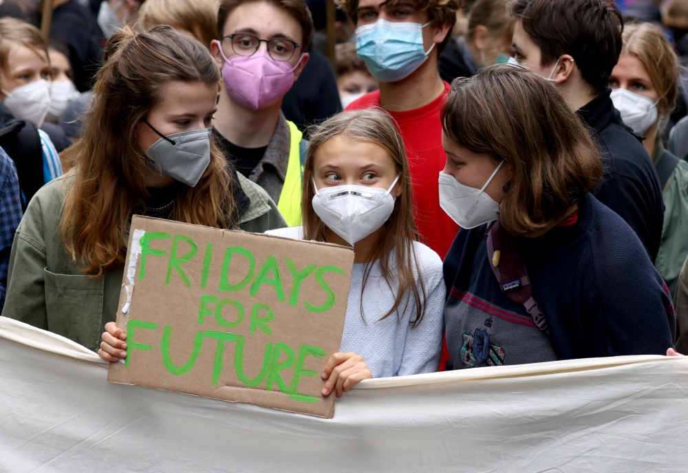 Swedish environmental activist Greta Thunberg attends the Global Climate Strike of the movement Fridays for Future in Berlin, Germany, September 24, 2021. REUTERS/Christian Mang